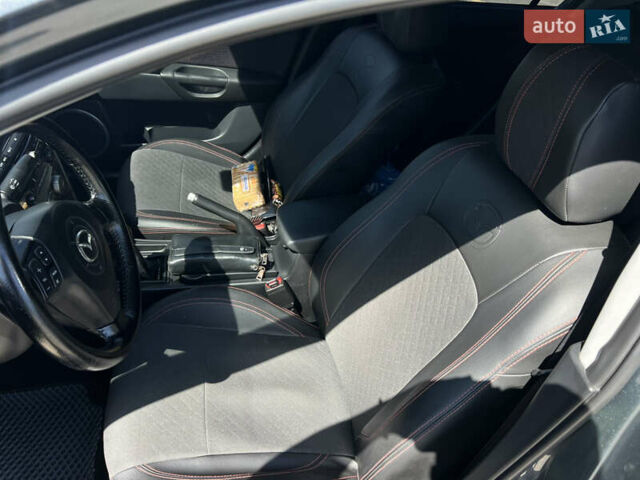 Серый Мазда 3, объемом двигателя 1.6 л и пробегом 246 тыс. км за 6400 $, фото 9 на Automoto.ua