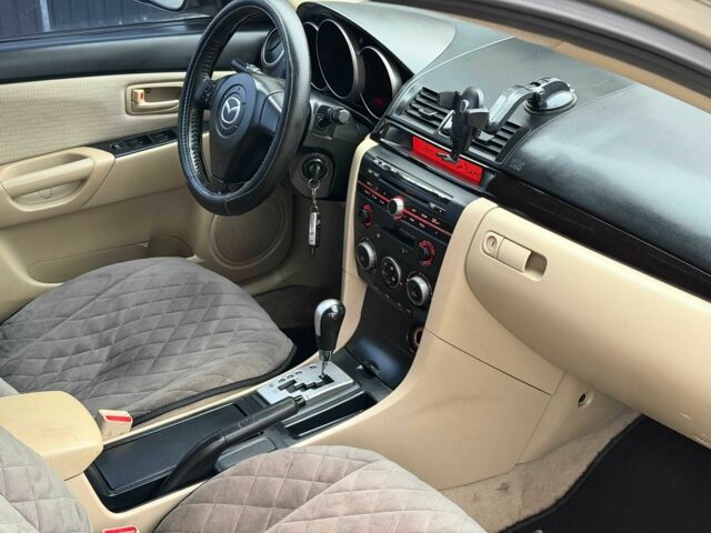 Серый Мазда 3, объемом двигателя 1.6 л и пробегом 170 тыс. км за 6000 $, фото 12 на Automoto.ua