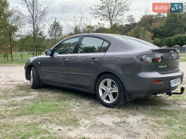 Сірий Мазда 3, об'ємом двигуна 1.6 л та пробігом 228 тис. км за 6100 $, фото 6 на Automoto.ua