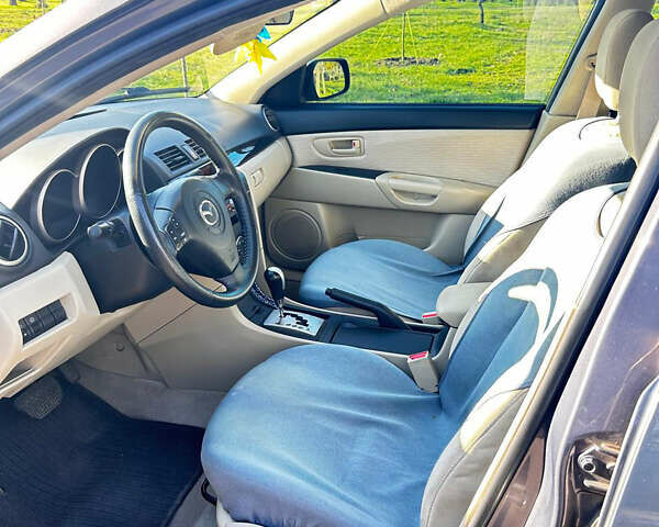 Серый Мазда 3, объемом двигателя 1.6 л и пробегом 89 тыс. км за 7500 $, фото 5 на Automoto.ua