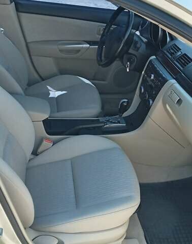 Серый Мазда 3, объемом двигателя 1.6 л и пробегом 192 тыс. км за 6700 $, фото 3 на Automoto.ua