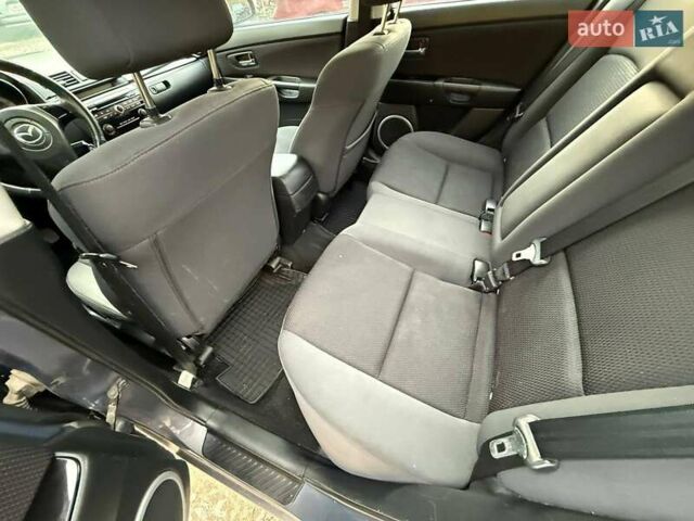 Серый Мазда 3, объемом двигателя 1.6 л и пробегом 230 тыс. км за 4000 $, фото 3 на Automoto.ua