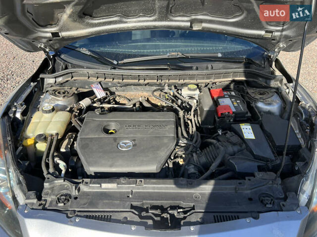 Сірий Мазда 3, об'ємом двигуна 2 л та пробігом 145 тис. км за 6200 $, фото 20 на Automoto.ua