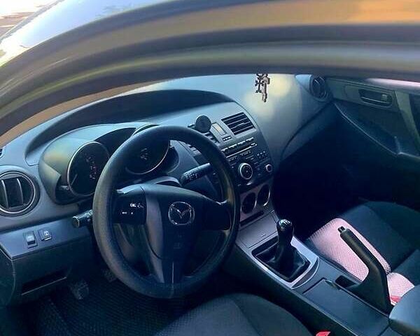 Серый Мазда 3, объемом двигателя 2 л и пробегом 145 тыс. км за 6750 $, фото 3 на Automoto.ua