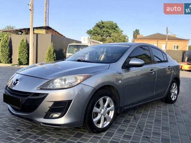 Серый Мазда 3, объемом двигателя 1.56 л и пробегом 280 тыс. км за 6000 $, фото 1 на Automoto.ua
