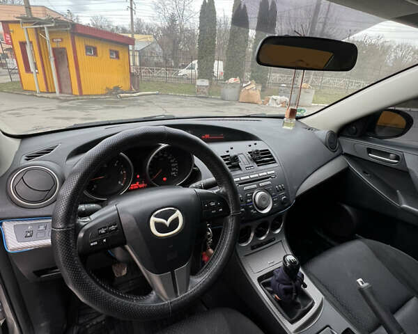 Серый Мазда 3, объемом двигателя 1.6 л и пробегом 230 тыс. км за 5498 $, фото 13 на Automoto.ua
