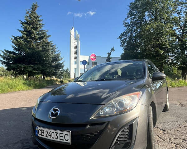 Серый Мазда 3, объемом двигателя 2 л и пробегом 168 тыс. км за 7300 $, фото 1 на Automoto.ua