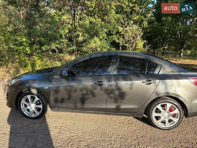 Серый Мазда 3, объемом двигателя 1.56 л и пробегом 193 тыс. км за 6900 $, фото 5 на Automoto.ua