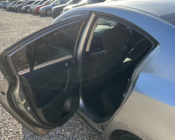 Сірий Мазда 3, об'ємом двигуна 2 л та пробігом 145 тис. км за 6200 $, фото 16 на Automoto.ua