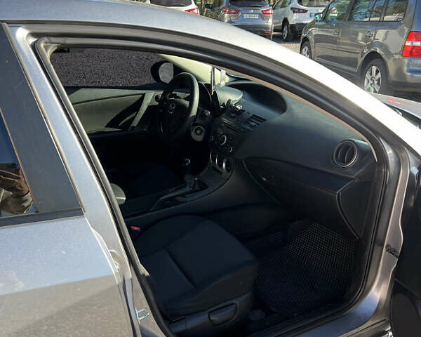 Сірий Мазда 3, об'ємом двигуна 2 л та пробігом 145 тис. км за 6200 $, фото 15 на Automoto.ua