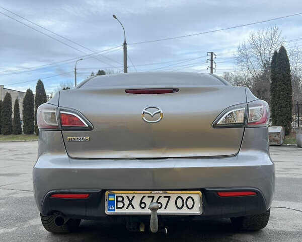Серый Мазда 3, объемом двигателя 1.6 л и пробегом 230 тыс. км за 5498 $, фото 1 на Automoto.ua