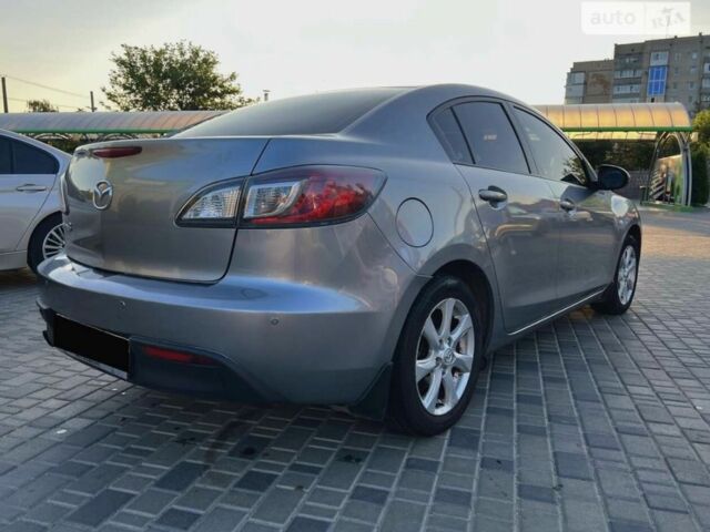 Серый Мазда 3, объемом двигателя 1.6 л и пробегом 280 тыс. км за 5500 $, фото 2 на Automoto.ua