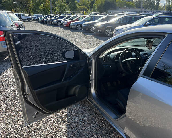 Сірий Мазда 3, об'ємом двигуна 2 л та пробігом 145 тис. км за 6200 $, фото 9 на Automoto.ua