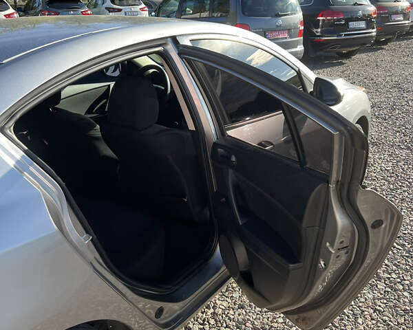 Сірий Мазда 3, об'ємом двигуна 2 л та пробігом 145 тис. км за 6200 $, фото 17 на Automoto.ua