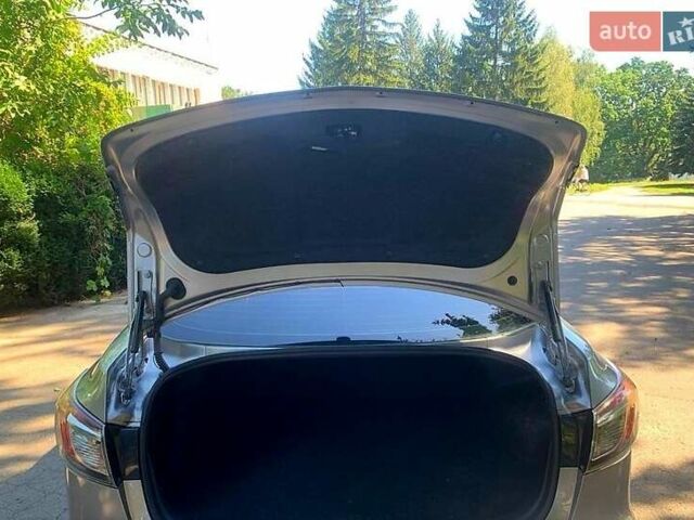 Серый Мазда 3, объемом двигателя 2 л и пробегом 145 тыс. км за 6750 $, фото 7 на Automoto.ua
