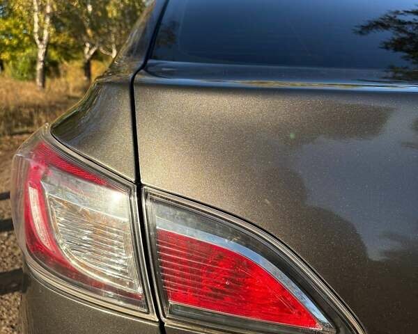 Серый Мазда 3, объемом двигателя 1.56 л и пробегом 193 тыс. км за 6700 $, фото 4 на Automoto.ua