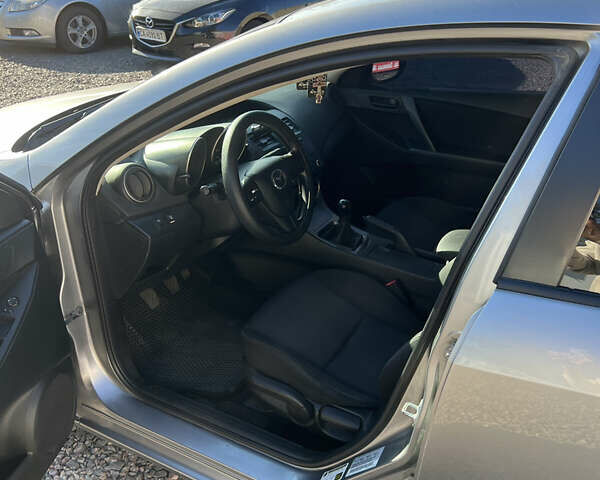 Сірий Мазда 3, об'ємом двигуна 2 л та пробігом 145 тис. км за 6200 $, фото 10 на Automoto.ua