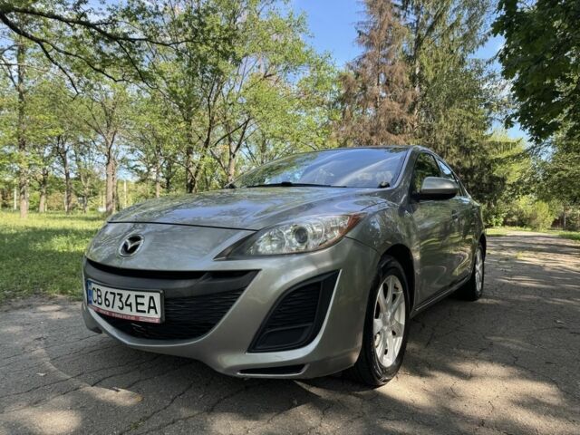 Серый Мазда 3, объемом двигателя 2 л и пробегом 165 тыс. км за 5999 $, фото 1 на Automoto.ua