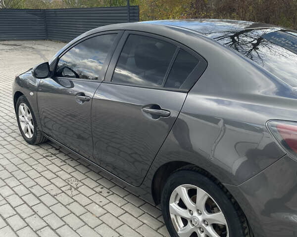 Мазда 3 2010 в Ивано-Франковске на Automoto.ua Серый Мазда 3, объемом двигателя 1.6 л и пробегом 198 тыс. км за 6700 $, фото 5 на Automoto.ua