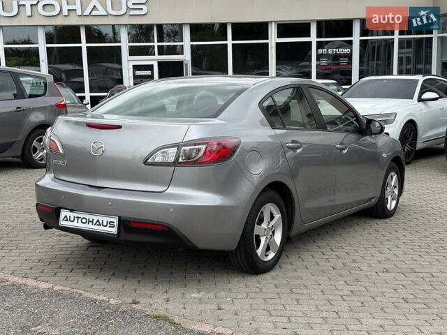 Серый Мазда 3, объемом двигателя 1.6 л и пробегом 128 тыс. км за 7999 $, фото 3 на Automoto.ua