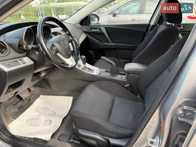 Серый Мазда 3, объемом двигателя 1.6 л и пробегом 128 тыс. км за 7999 $, фото 6 на Automoto.ua