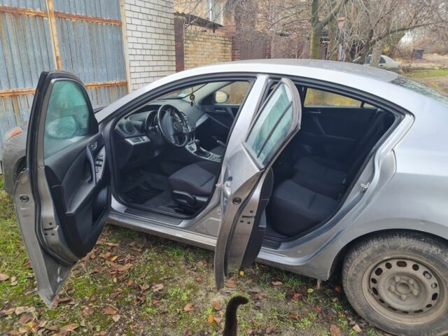 Серый Мазда 3, объемом двигателя 1.5 л и пробегом 53 тыс. км за 7900 $, фото 4 на Automoto.ua