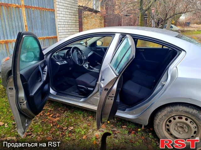 Сірий Мазда 3, об'ємом двигуна 1.6 л та пробігом 53 тис. км за 7900 $, фото 4 на Automoto.ua