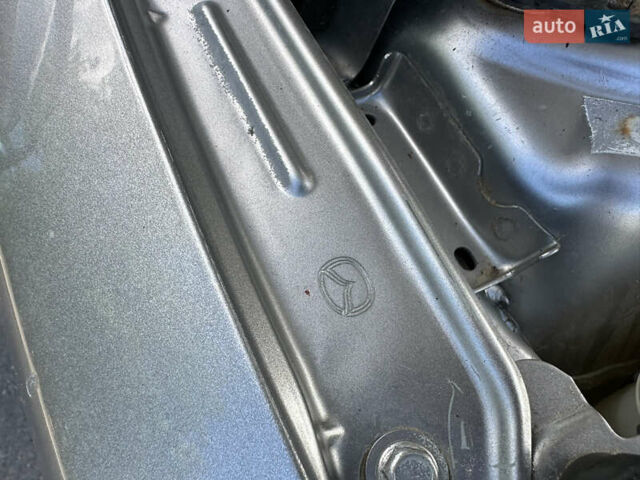 Сірий Мазда 3, об'ємом двигуна 2 л та пробігом 170 тис. км за 5799 $, фото 2 на Automoto.ua