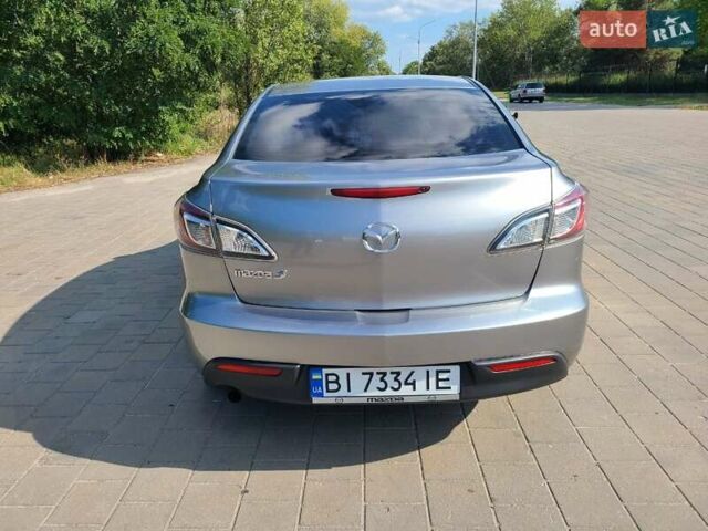 Серый Мазда 3, объемом двигателя 1.6 л и пробегом 240 тыс. км за 7200 $, фото 7 на Automoto.ua
