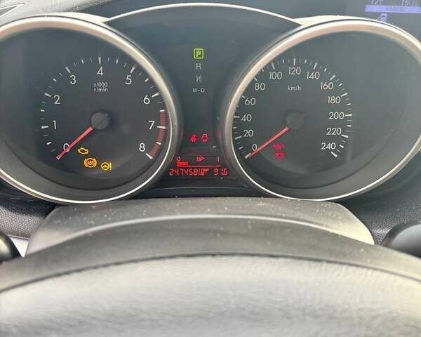 Серый Мазда 3, объемом двигателя 1.6 л и пробегом 247 тыс. км за 6800 $, фото 5 на Automoto.ua