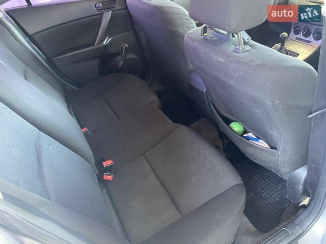 Сірий Мазда 3, об'ємом двигуна 1.6 л та пробігом 187 тис. км за 7300 $, фото 24 на Automoto.ua