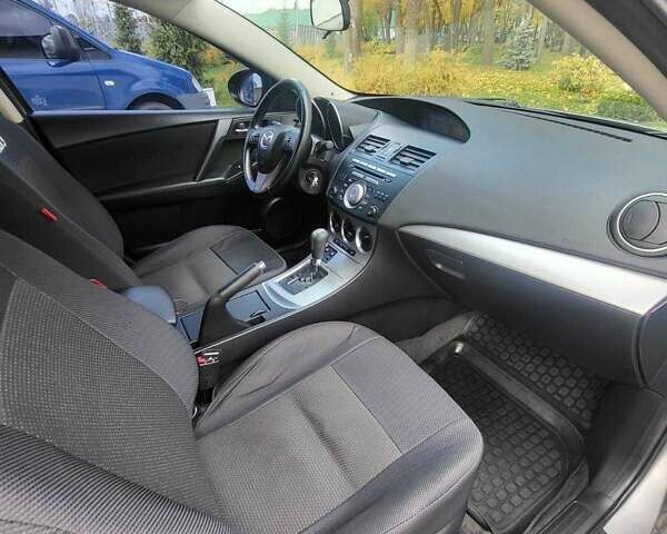 Серый Мазда 3, объемом двигателя 1.6 л и пробегом 113 тыс. км за 8700 $, фото 17 на Automoto.ua