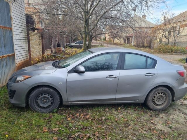 Серый Мазда 3, объемом двигателя 1.5 л и пробегом 53 тыс. км за 7900 $, фото 5 на Automoto.ua