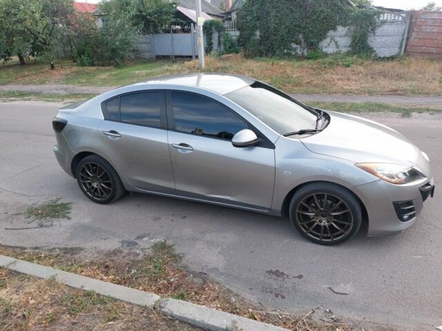 Серый Мазда 3, объемом двигателя 1.6 л и пробегом 320 тыс. км за 6999 $, фото 5 на Automoto.ua