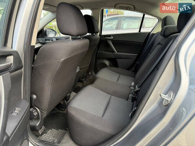 Серый Мазда 3, объемом двигателя 1.6 л и пробегом 128 тыс. км за 7999 $, фото 8 на Automoto.ua