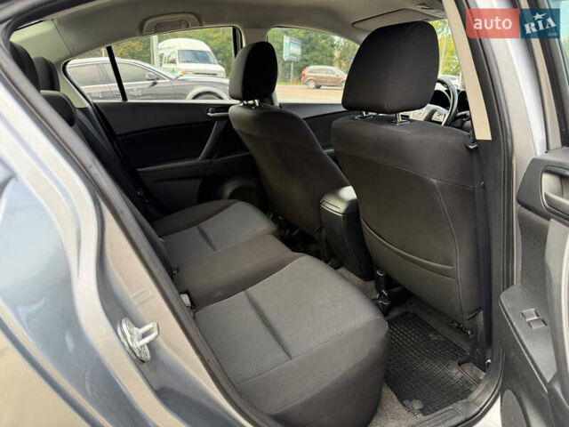 Серый Мазда 3, объемом двигателя 1.6 л и пробегом 128 тыс. км за 7999 $, фото 9 на Automoto.ua