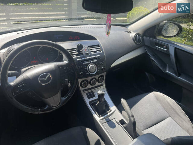 Серый Мазда 3, объемом двигателя 1.6 л и пробегом 196 тыс. км за 6900 $, фото 17 на Automoto.ua
