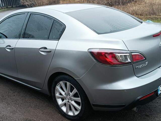 Серый Мазда 3, объемом двигателя 1.6 л и пробегом 240 тыс. км за 6500 $, фото 1 на Automoto.ua