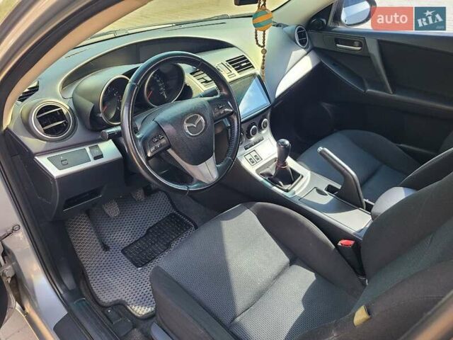 Серый Мазда 3, объемом двигателя 1.6 л и пробегом 240 тыс. км за 7200 $, фото 13 на Automoto.ua
