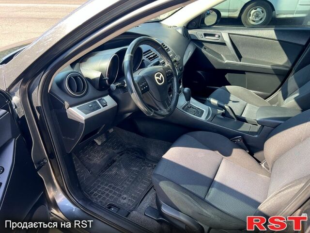 Серый Мазда 3, объемом двигателя 2 л и пробегом 190 тыс. км за 6900 $, фото 10 на Automoto.ua