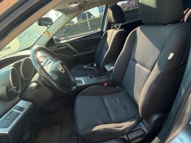 Серый Мазда 3, объемом двигателя 2 л и пробегом 210 тыс. км за 6900 $, фото 6 на Automoto.ua