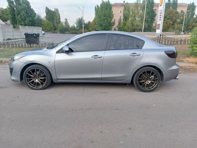 Серый Мазда 3, объемом двигателя 1.6 л и пробегом 320 тыс. км за 6999 $, фото 2 на Automoto.ua