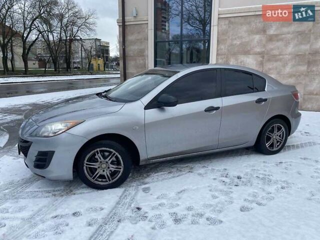 Сірий Мазда 3, об'ємом двигуна 1.6 л та пробігом 189 тис. км за 7300 $, фото 12 на Automoto.ua