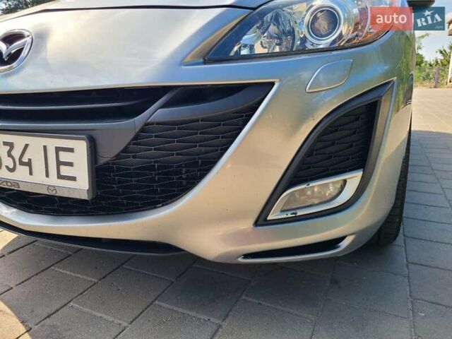 Серый Мазда 3, объемом двигателя 1.6 л и пробегом 240 тыс. км за 7200 $, фото 9 на Automoto.ua