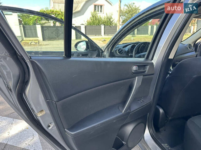 Сірий Мазда 3, об'ємом двигуна 2 л та пробігом 170 тис. км за 5799 $, фото 14 на Automoto.ua