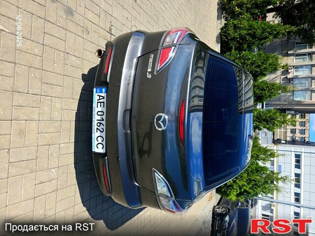 Серый Мазда 3, объемом двигателя 1.6 л и пробегом 118 тыс. км за 9900 $, фото 2 на Automoto.ua