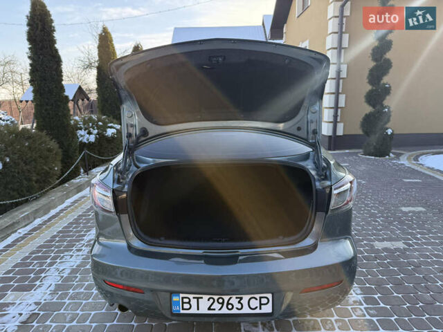 Сірий Мазда 3, об'ємом двигуна 2 л та пробігом 214 тис. км за 7250 $, фото 18 на Automoto.ua