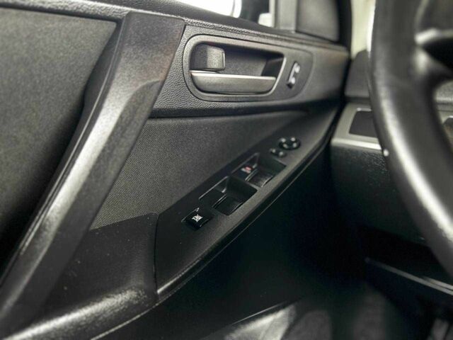 Сірий Мазда 3, об'ємом двигуна 2 л та пробігом 141 тис. км за 7599 $, фото 19 на Automoto.ua