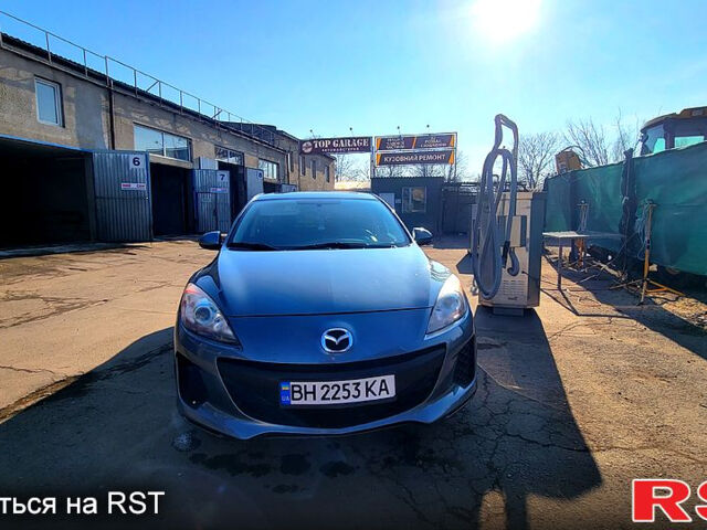 Серый Мазда 3, объемом двигателя 2 л и пробегом 170 тыс. км за 7300 $, фото 1 на Automoto.ua