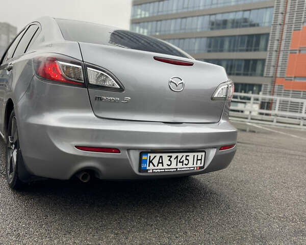 Сірий Мазда 3, об'ємом двигуна 2 л та пробігом 200 тис. км за 8500 $, фото 8 на Automoto.ua